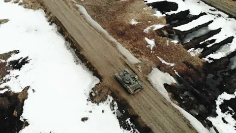 At the military training ground there is a tank and shoots, Aerial view Stockbeeldmateriaal 153427853