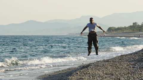 Military training on the seashore Stock Footage 265440999