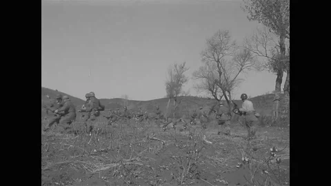 Military troops do field practice in mock attack against a village - 1950 Video stock 94068016