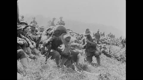Military troops resting on grass Stock Footage 43328633