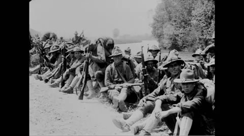 Military troops resting on grass Stock Footage 43328649