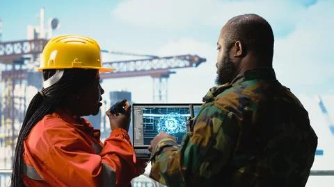 Military unit on offshore rig using AI automated counter terrorism systems Stock Photos