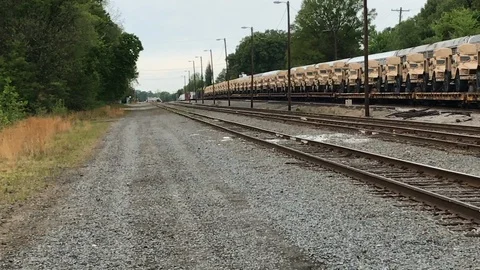 Military vehicles on train Stock Footage 130129847