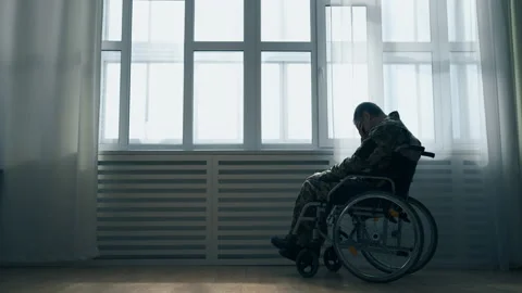 Military veteran with disability feeling lonely and abandoned in hospital Stock Footage