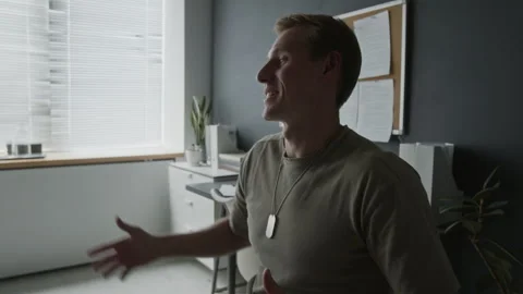 Military Veteran Man Explaining Trauma during Therapy Session Stock Footage 340636660