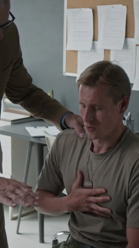 Military Veteran Practicing Breathing Exercise with Therapist Stock Footage 340641753