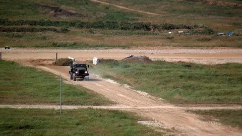 Military war machine machine runs an obstacle course. Video stock 120092059