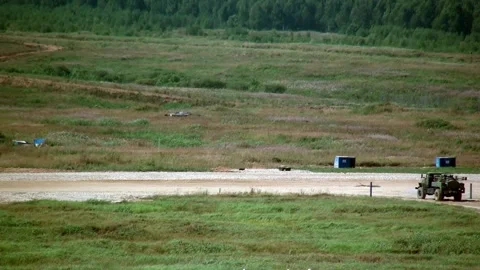 Military war machine machine runs an obstacle course. Stock Footage 155149208