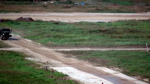 Military war machine machine runs an obstacle course. Stock Footage 155149218