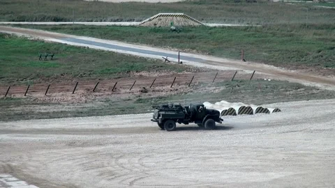 Military war machine machine runs an obstacle course. Stock Footage 155149341