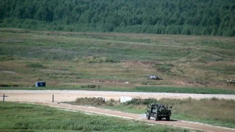 Military war machine machine runs an obstacle course. Stock Footage 155149460