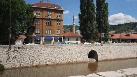 Miljacka river With Old town in Background, Sarajevo, Bosnia, Pan Stock Footage 217372633