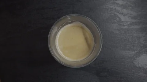 Milk is added to coffee Stock Footage 101661872