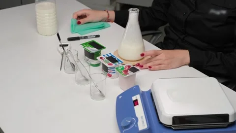 Milk analysis experiment in laboratory Stock Footage 306325547