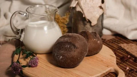 Milk and bread Stock Photos