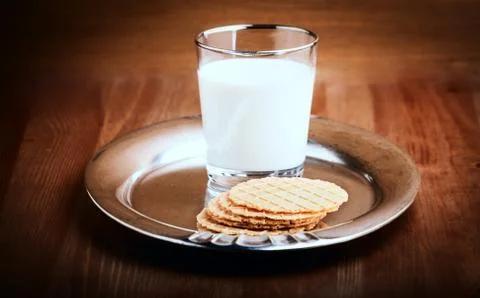 Milk and crackers Stock Photos