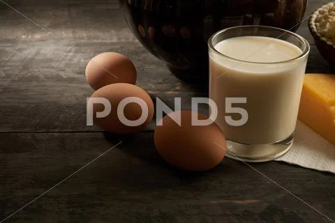 Milk and eggs on the table Stock Photos