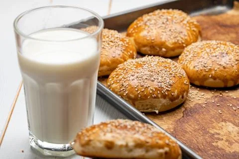 Milk and sesame bread Stock Photos