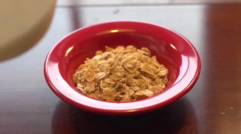 Milk being poured onto cereal 2 Stock Footage 47004330