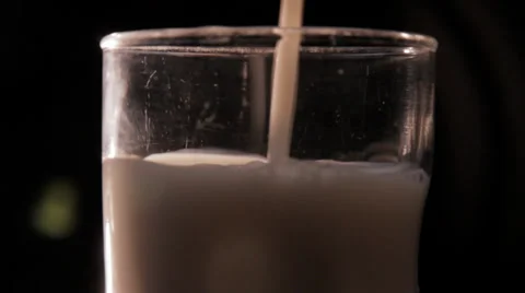 Milk Being Pouring - Black Background Stock Footage 34206203