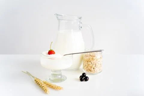 Milk with berries Stock Photos