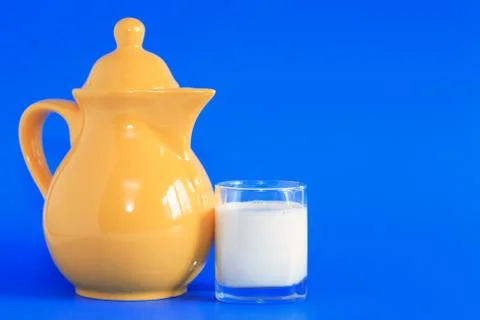 Milk on blue Stock Photos