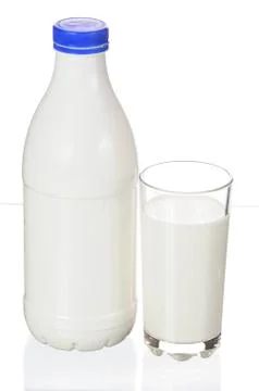 Milk into bottle Stock Photos