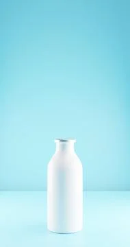 Milk bottle on the table. Stock Photos