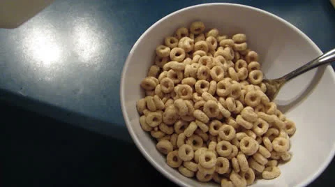 Milk on Cereal Stock Footage 22540347