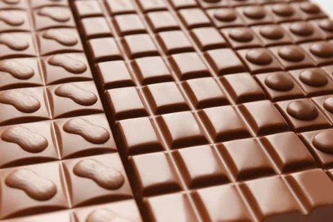 Milk chocolate as a background Stock Photos