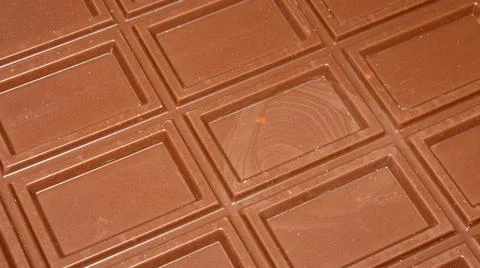 Milk chocolate background with rectangular block pattern. Foto stock