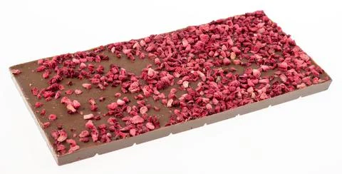 Milk chocolate with dried small raspberry pieces Stock Photos