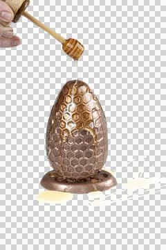 Milk chocolate Easter egg filled with Brazilian honey cake 3.PNG Stock Photos