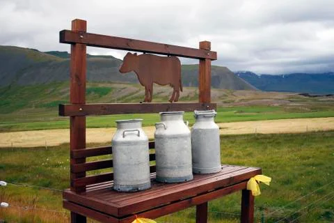 Milk churns Stock Photos