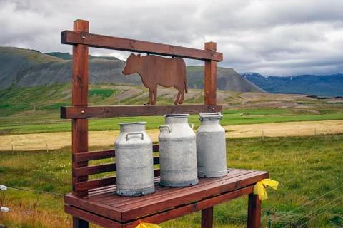 Milk churns Stock Photos
