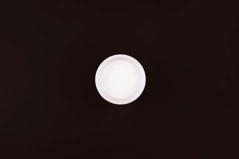 Milk on dark background Stock Photos