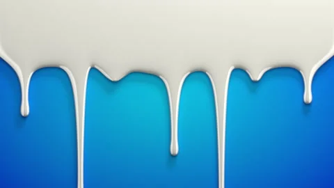 Milk drips on blue Stock Footage 156748233