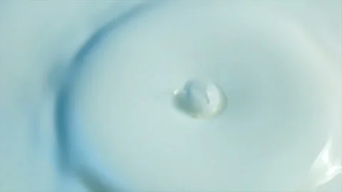 Milk drop falling in slow motion. 스톡 동영상 145349943