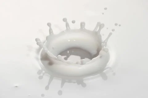 Milk drop Stock Photos