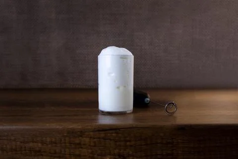 Milk foam maker. Mini blender, frothers for coffee, latte Stock Photos