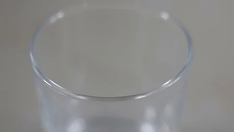 Milk glass close-up Stock Footage 73384868