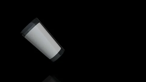 Milk Glass Turns on itself - loop animation Stock Footage 251688988