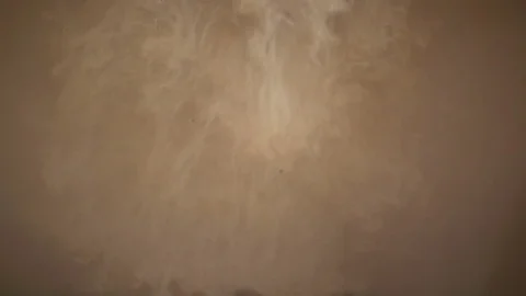 Milk Mixes With A Coffee Stock Footage 76883082
