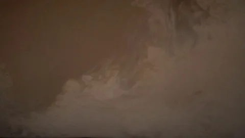Milk Mixes With A Coffee Stock Footage 76883166