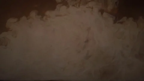 Milk Mixes With A Coffee Stock Footage 76883248