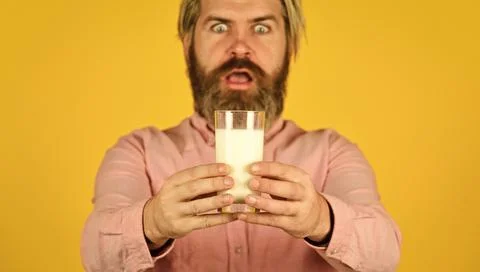 Milk Pasteurization in Dairy Processing Plant. selective focus. surprised man Stock Photos