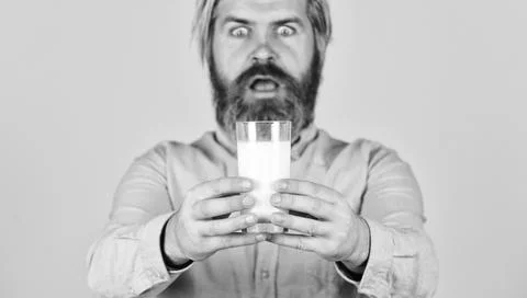 Milk Pasteurization in Dairy Processing Plant. selective focus. surprised man Stock Photos