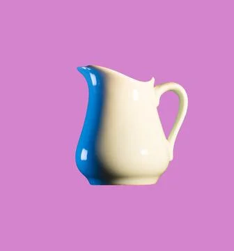 Milk Pitcher on Pink Background Stock Photos