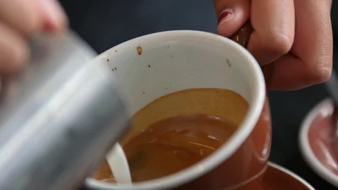 Milk Poured Into Coffee Cup Vídeos de archivo 86672957