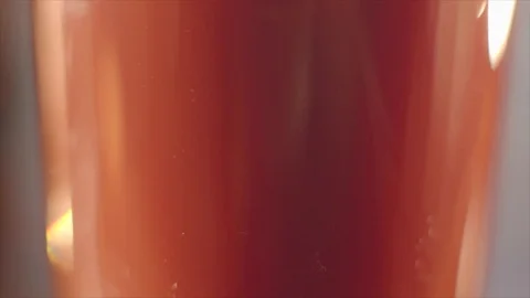 Milk is poured into coffee Stock Footage 117534386